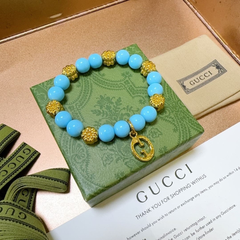 G*u*i bracelets